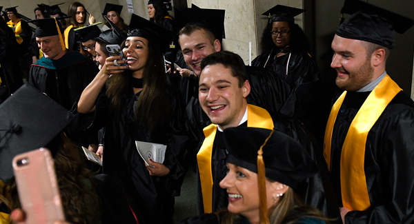Back stage preparing for Central Penn College's Commencement Ceremony