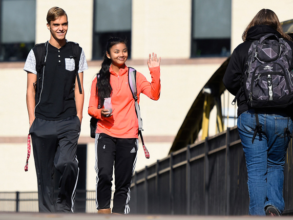 Natalie walking the bridge to success